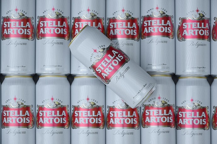 many-tin-cans-of-stella-artois-beer-outdoors-stella-artois-is-the-most-famous-belgian-beer-in-the-world-owned-by-ab-inbev-free-photo